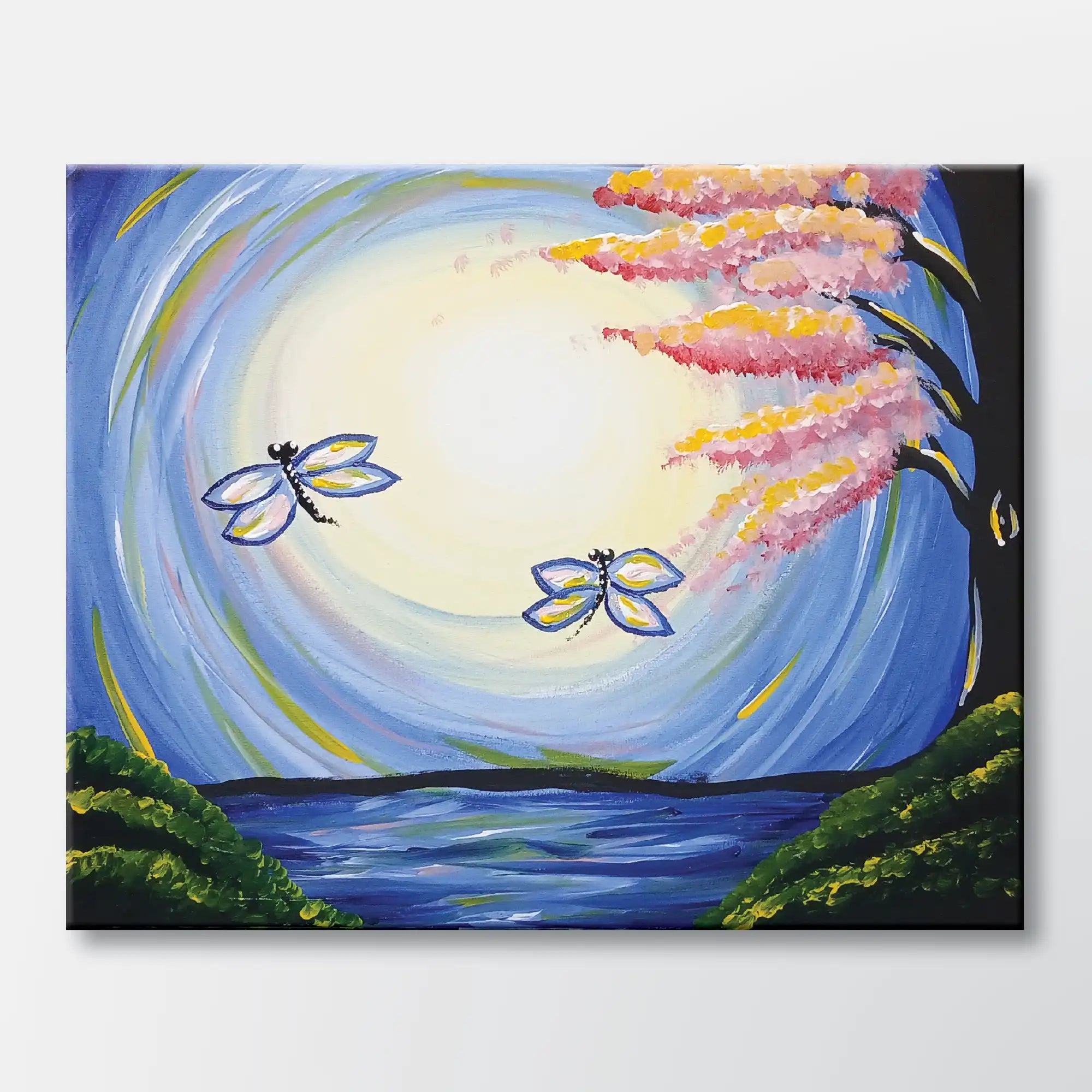 Dragonfly Moon painting kit featuring two dragonflies beneath a full moon - beginner paint-at-home project with canvas, paints, and video tutorial.