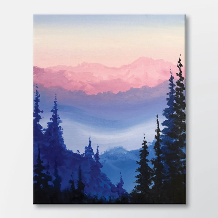 Hazy Range painting kit featuring layered mountain ridges framed by pine trees - beginner paint-at-home project with canvas, paints, and video tutorial.