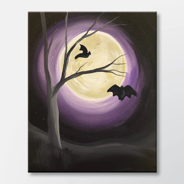 Wicked Wings painting kit featuring bats in front of a full moon - beginner paint-at-home project with canvas, paints, and video tutorial.