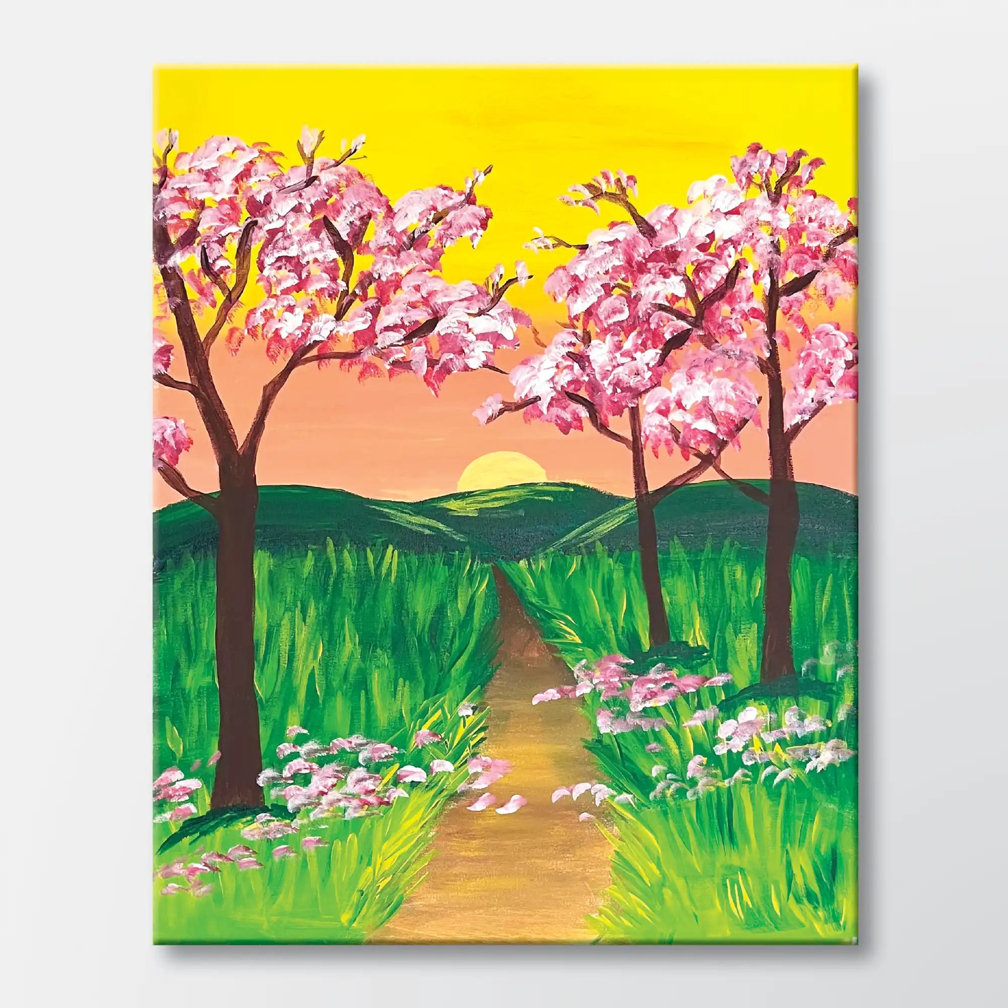Cherry Blossom Lane painting kit featuring cherry blossom trees along a winding path - beginner paint-at-home project with canvas, paints, and video tutorial.