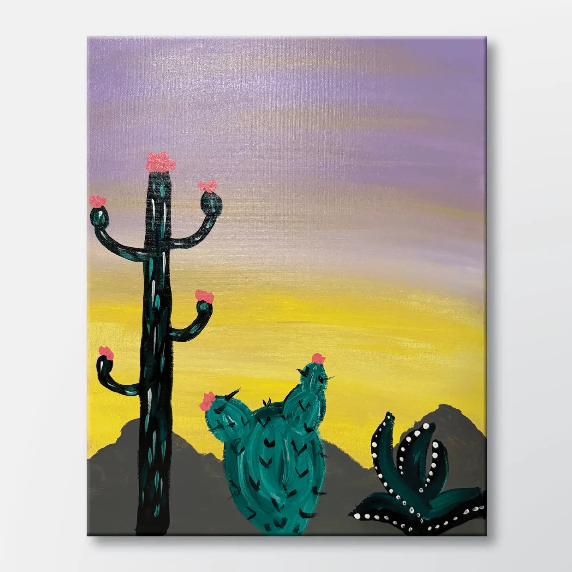 Desert in Bloom painting kit featuring blooming cacti against a dusk desert sky - beginner paint-at-home project with canvas, paints, and video tutorial.