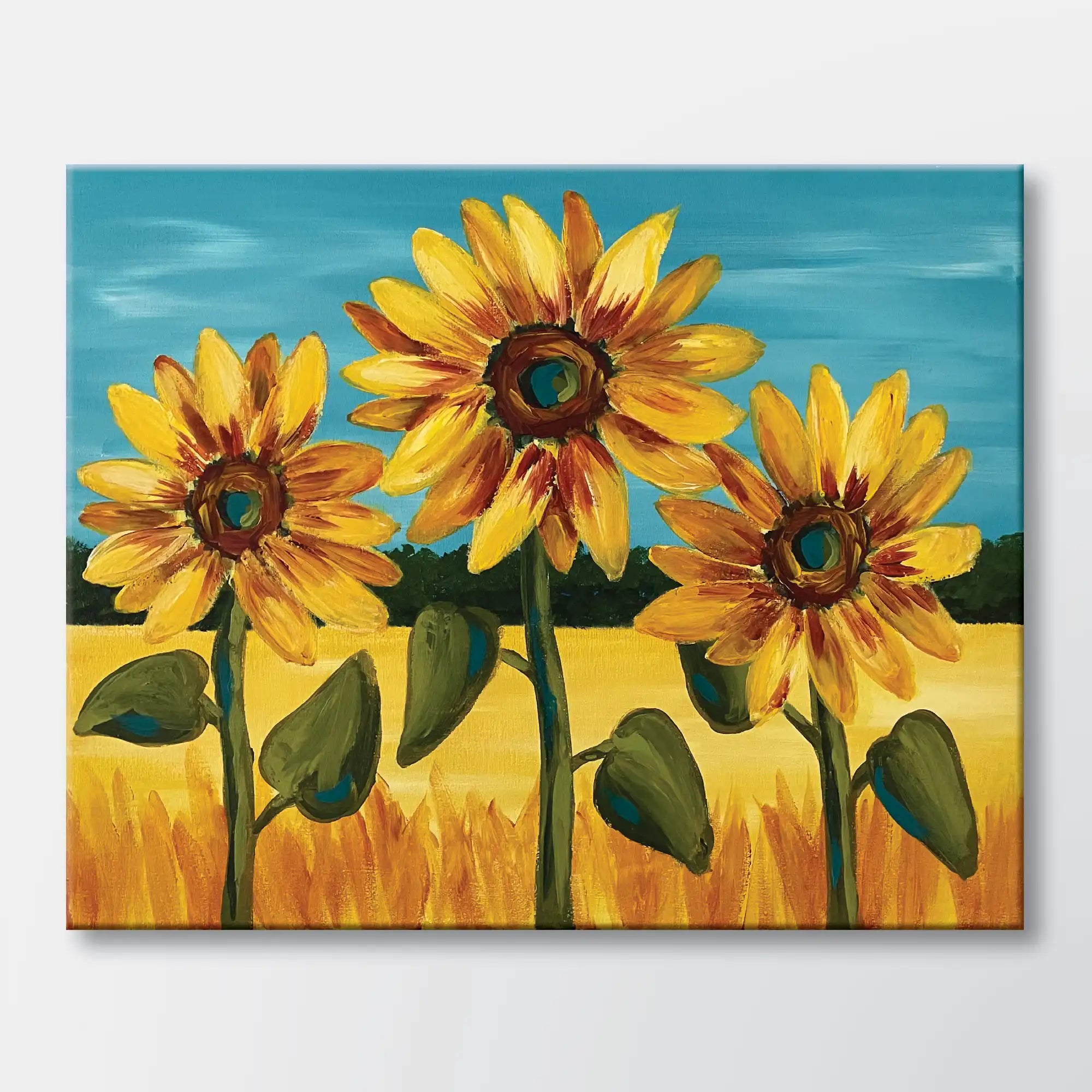 Sunflower Sisters painting kit featuring three sunflowers in a golden summer field – beginner paint-at-home project with canvas, paints, and video tutorial.